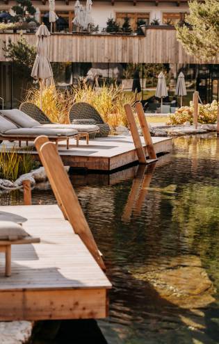 Bathing lake - Naturhotel Forsthofgut Karriere