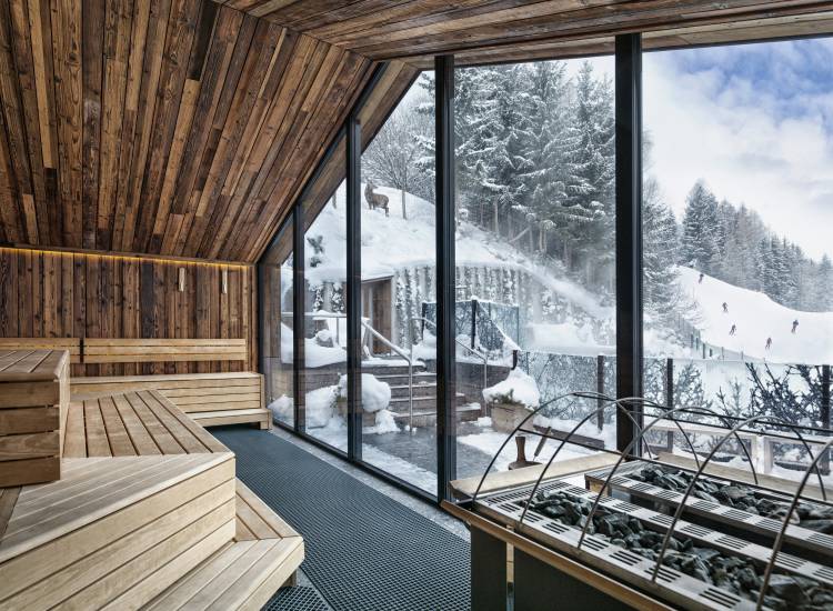 Outdoor pool overlooking ski slope in winter